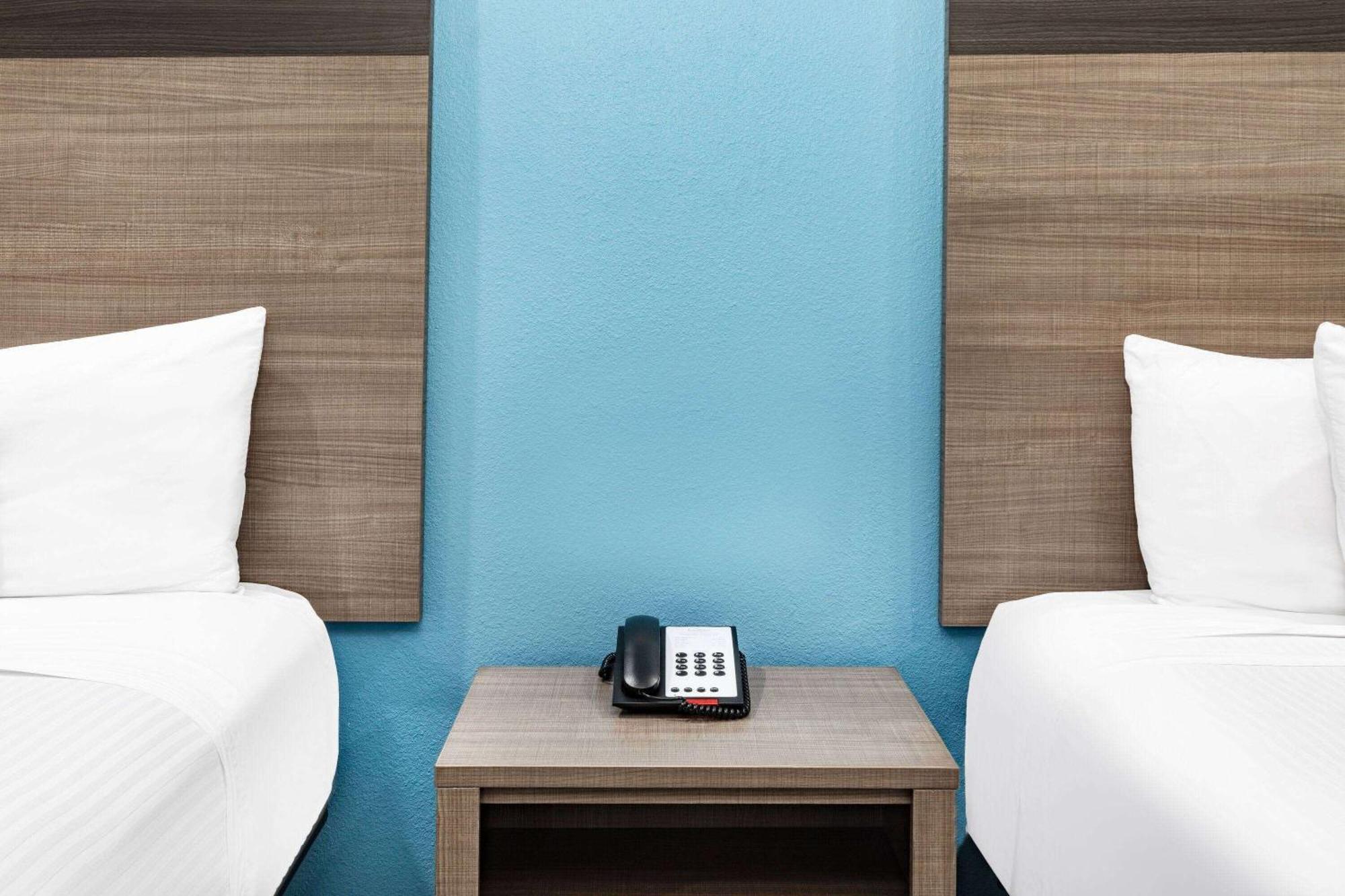 ホテル Baymont By Wyndham Freeport Texas エクステリア 写真